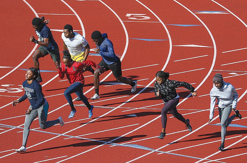 Lincoln University track team members practice earlier this year at Dwight T. Reed Stadium.