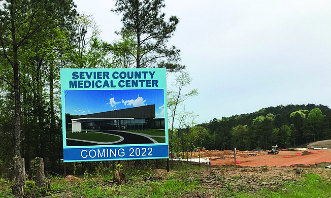 A sign on U.S. Highway 71 announces the location of the Sevier County Medical Center that is scheduled to open in early 2022.