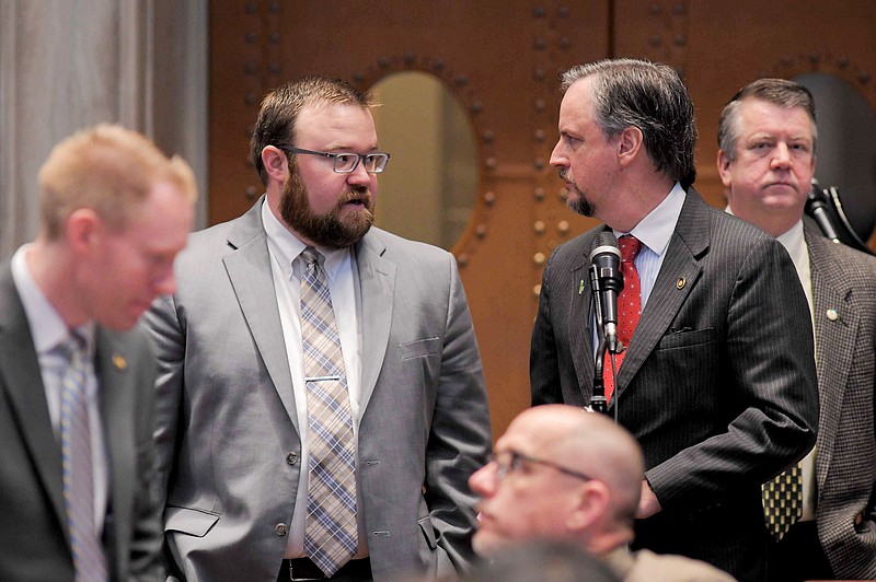 Rep. Jered Taylor, R-Springfield, and Rep. J. Eggleston, R-Maysville, speak as members of the House discuss HB 1083, which would require the Department of Labor and Industrial Relations to waive the recovery of non-fraudulent overpayment of unemployment benefits if the funds distributed originate from the CARES Act or any other coronavirus-related federal legislation or program.