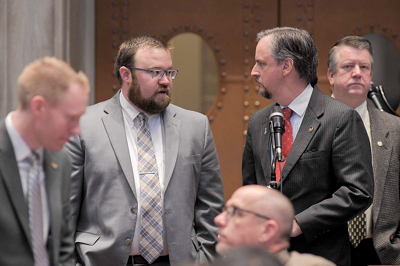 <p>File photo</p><p>Rep. Jered Taylor, R-Springfield, and Rep. J. Eggleston, R-Maysville, speak as members of the House discuss HB 1083, which would require the Department of Labor and Industrial Relations to waive the recovery of non-fraudulent overpayment of unemployment benefits if the funds distributed originate from the CARES Act or any other coronavirus-related federal legislation or program.</p>