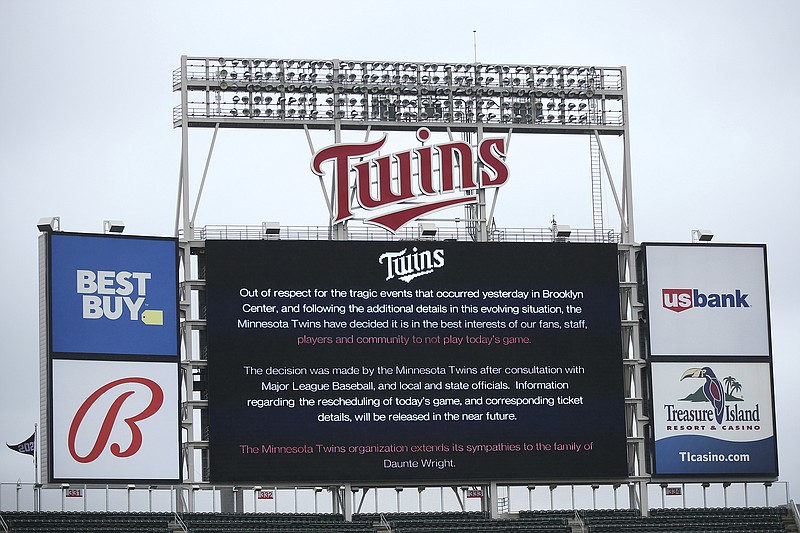The scoreboard at Target Field explains the postponement of the game Monday between the Twins and Red Sox in Minneapolis.