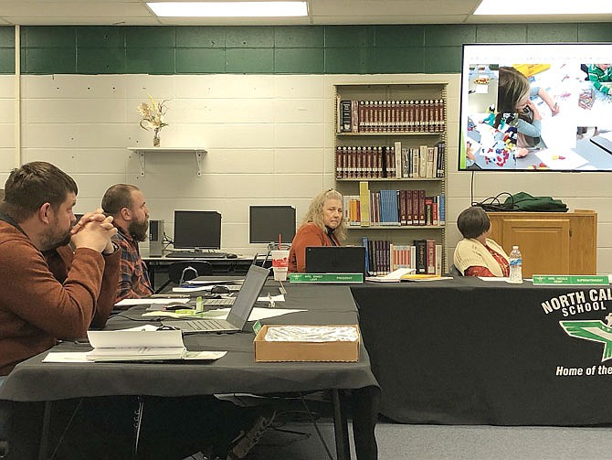 FILE: North Callaway R-1 Board of Education members and Superintendent Nicky Kemp, right, watch a video presentation during the board's March 18 meeting in the high school media center in Kingdom City. The board will hold its April meeting at 7 p.m. Thursday.