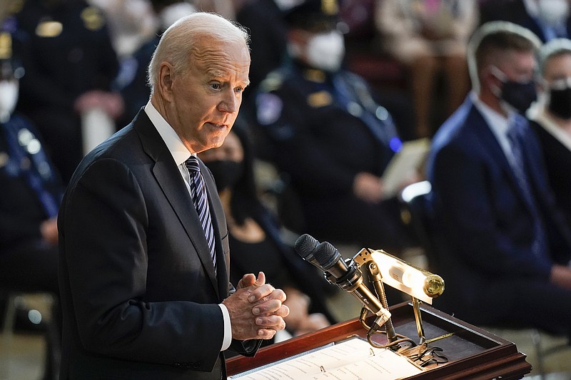 President Joe Biden speaks during a ceremony to honor slain U.S. Capitol Police officer William "Billy" Evans as he lies in honor at the Capitol in Washington, Tuesday, April 13, 2021. (AP Photo/J. Scott Applewhite, Pool)