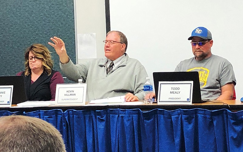 Superintendent Kevin Hillman discusses an agenda item while board members Todd Mealy, right, and Stephanie Laney listen during the South Callaway R-2 Board of Education meeting Wednesday night, April 14, 2021, at the high school in Mokane.