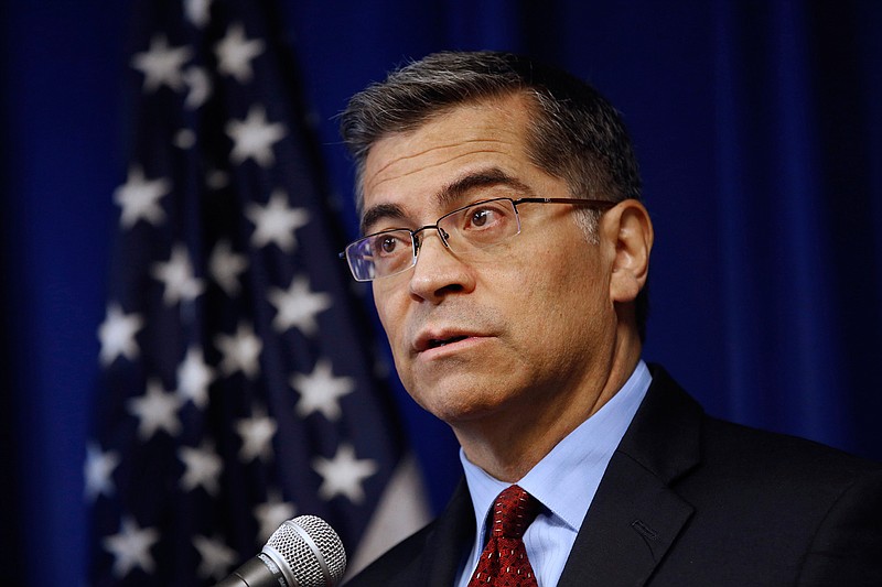 In this Dec. 4, 2019, file photo, Xavier Becerra speaks during a news conference in Sacramento, Calif. Federal officials have reversed Trump administration restrictions on using human fetal tissue for medical research. The move clears the way for using government money on work that in the past has led to treatments for a variety of diseases, including COVID-19. The changes announced Friday, April 16, 2021 allow government scientists to resume research that uses tissue from elective abortions. Scientists at universities also can now apply for federal grants without getting approval from a special ethics panel for any such work. The changes overturn rules imposed in June 2019. Health and Human Services Secretary Xavier Becerra determined there were "no new ethical issues that require special review," so the agency will return to using procedures that had been in place for decades before the Trump policy change in June 2019, a statement from the agency said. (AP Photo/Rich Pedroncelli, File)