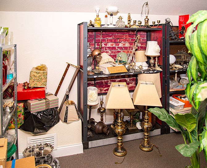 Volunteers worked Saturday to clean the prop room at the Little Theatre's audition space, 1005 Chestnut St., in preparation for "The Wizard of Oz" auditions. 