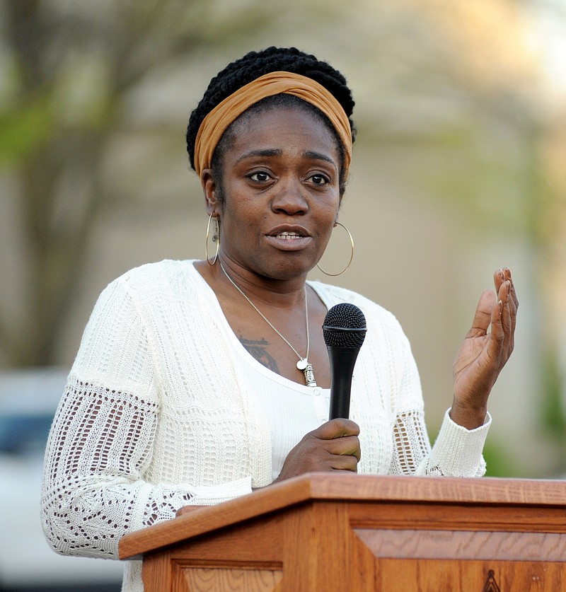 Boone County Community Against Violence founder, Shaunda Hamilton, gives an emotional speach to the crowd gathered for the Candlelight Vigil for Crime Victim's Rights outside the Cole County Sheriff's Office on High Street. Shaun Zimmerman / News Tribune photo