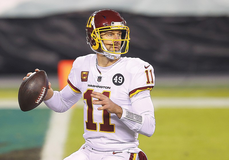 In this Jan. 3 file photo, Washington Football Team quarterback Alex Smith is shown in action against the Eagles during a game in Philadelphia,