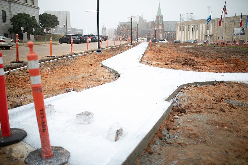 Portions of State Line Avenue near the Downtown Post Office are closed as construction on the Courthouse Square Project continues in this Gazette file photo taken in November 2020. 