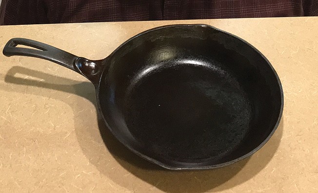  This skillet has been in John Moore's family for four generations.