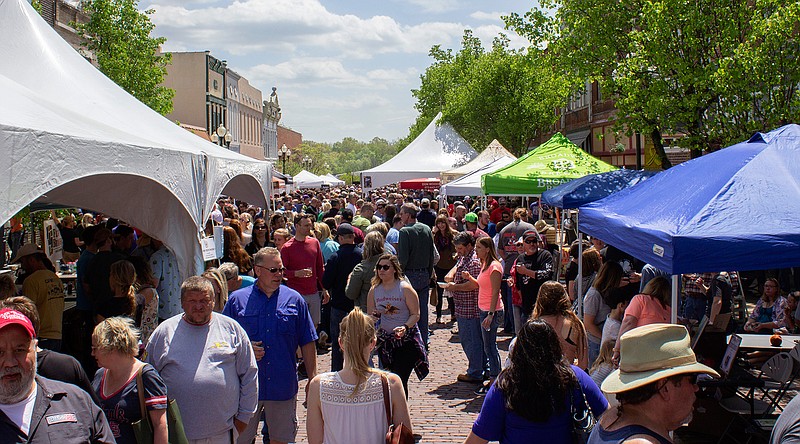 A crowd swarms Court Street in downtown Fulton for a previous Morels and Microbrews. The popular event — which was canceled last year due to COVID-19 — returns Saturday from noon-4 p.m.