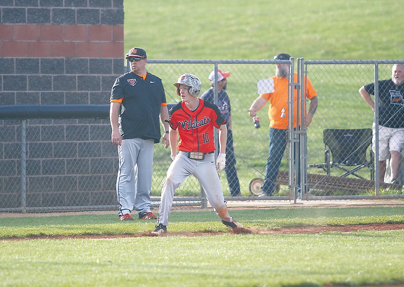 New Bloomfield's Dylan Brenneke takes a lead off of third base during Monday night's game against Calvary Lutheran in New Bloomfield.