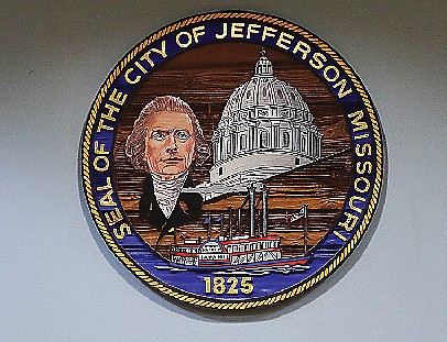 The seal of the City of Jefferson hangs in the council chambers at the John G. Christy Municipal Building, also known as city hall, in Jefferson City.