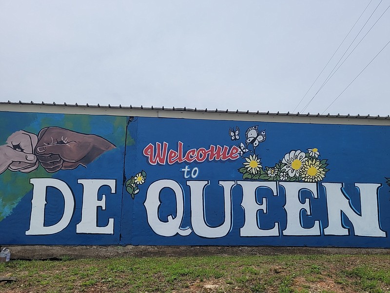Darlene Taylor was hired by the Minority Affairs Council in De Queen to create this "Welcome to De Queen" mural.