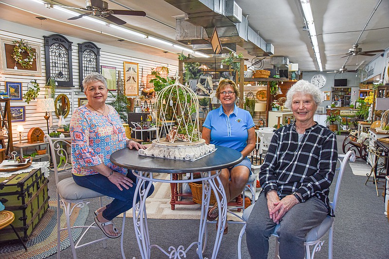 Julie Smith/News Tribune
Marla Nilges, at left, is seated with her sister-in-law Debbie Sawyer, middle and her mother-in-law, Rita Nilges at the Cotter Pin Cellar at 1500 E. McCarty St.