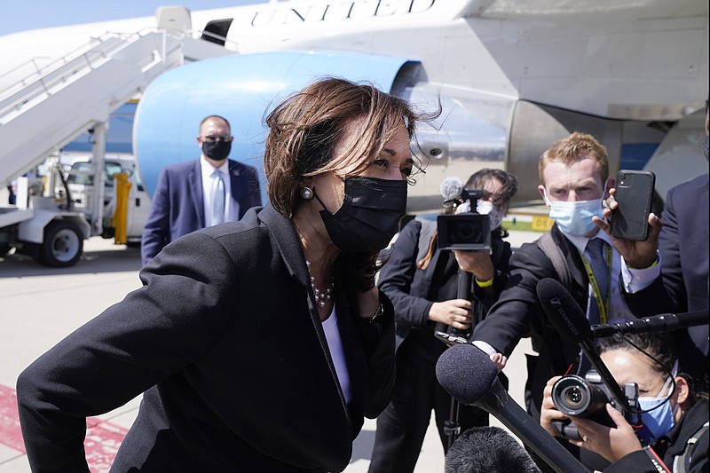 Vice President Kamala Harris speaks to the media on India, prior to boarding Air Force Two, Friday, April 30, 2021, at Cincinnati/Northern Kentucky International Airport, in Hebron, Ky., on return to Washington. (AP Photo/Jacquelyn Martin)