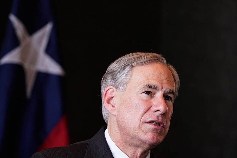 In this Wednesday, March 17, 2021, file photo, Texas Gov Greg Abbott speaks during a news conference about migrant children detentions, in Dallas. Texas child welfare officials say they've received three reports of abuse and neglect at a San Antonio coliseum that is holding more than 1,600 immigrant teenagers who crossed the southern border. Child welfare officials would not reveal details about who made the allegations, but Abbott said his understanding was that they came from someone who had been inside the facility. One of the allegations include sexual abuse, but no further details were provided. (AP Photo/LM Otero, File)