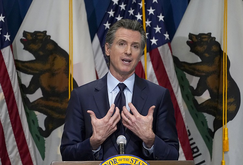 FILE - In this Jan. 8, 2021, file photo, California Gov. Gavin Newsom outlines his 2021-2022 state budget proposal during a news conference in Sacramento, Calif. The California Democratic Party is gathering for its annual convention on the heels of a recall against Newsom reaching the signature threshold to qualify for the ballot.   (AP Photo/Rich Pedroncelli, Pool, File)