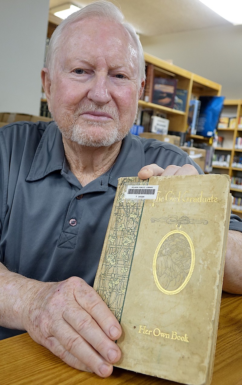 Local historian George Frost shows the 1916 yearbook of Hughes Springs High School student Grace Daniel. Daniel says in her book no one may know of her and her class 100 years from then to now. But George does.