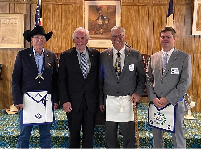 Boston Masonic Lodge recently presented two awards. From left are Worshipful Master Wayne McEntire; Fred Milton, who received the Community Builders Award; Brother Joseph Clifford Edwards, who received the 50-year-service award; and District Deputy Ryan Sykes.