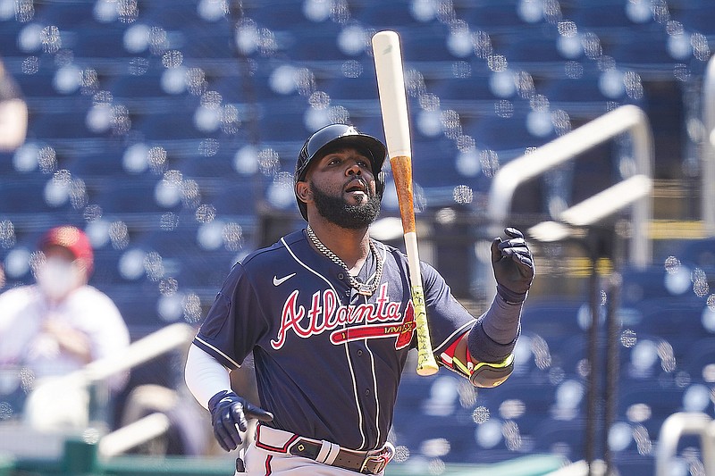 Marcell Ozuna of the Braves reacts after striking out during a game last month against the Nationals in Washington.