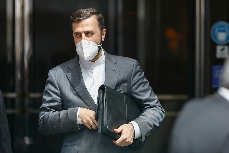 Iran's Governor to the International Atomic Energy Agency (IAEA), Kazem Gharib Abadi leaves the 'Grand Hotel Wien' where closed-door nuclear talks take place in Vienna, Austria, Friday, May 7, 2021. (AP Photo/Lisa Leutner)