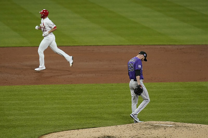 Rockies starting pitcher Austin Gomber walks around the mound as Jack Flaherty of the Cardinals rounds the bases after hitting a solo home run during the third inning of Friday night's game at Busch Stadium in St. Louis. 