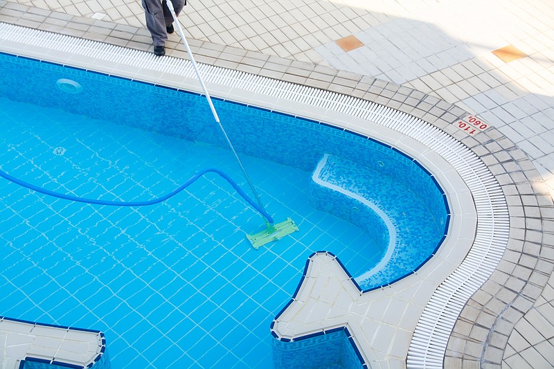 Professional cleaning makes a big difference in keeping your pool ready all summer long. (Dreamstime/TNS)