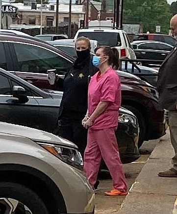 McKenna Belcher is led from a Miller County courtroom after being sentenced to life in prison without parole for beating her husband's daughter, 3-year-old McKinley Cawley, to death in 2019. Belcher's plea to first-degree murder spared her a possible death sentence in the case.
