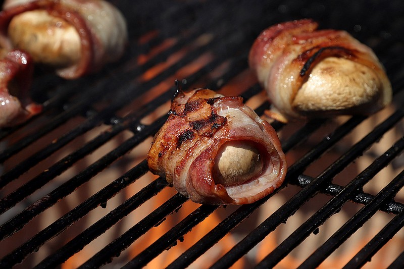 Savory S'mores, mushrooms with bacon and blue cheese, made on the grill. (Hillary Levin/St. Louis Post-Dispatch/TNS)