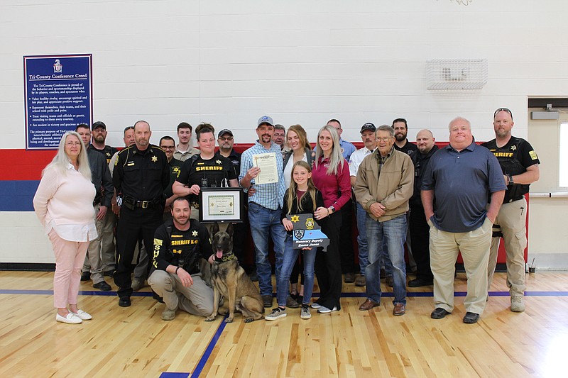 <p>Democrat photo/Austin Hornbostel</p><p>California Elementary School student Emma Jones was joined by her family members last week as she was honored by local law enforcement officers and first responders for her heroic actions last summer, when she saved her father’s life.</p>