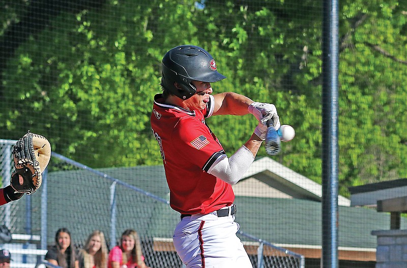 Jefferson City's Taylor Hopkins connects on a pitch Wednesday during a game against Gateway Legacy at Vivion Field.