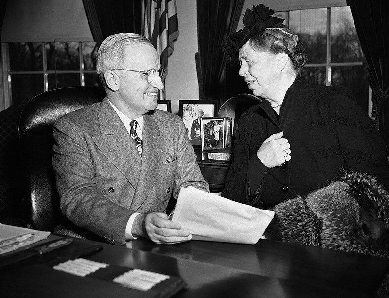 FILE - In this Feb. 27, 1946 file photo, Eleanor Roosevelt, right, wife of the late President Franklin Roosevelt, meets with President Harry S. Truman at the White House, in Washington. The Truman Library & Museum, closed since July 2019, is poised to reopen this year, with a 3,000-square-foot addition and new ways to make the story of Truman and his presidency relevant to what's happening today, radio station KCUR-FM reports. (AP Photo/Byron Rollins, File)