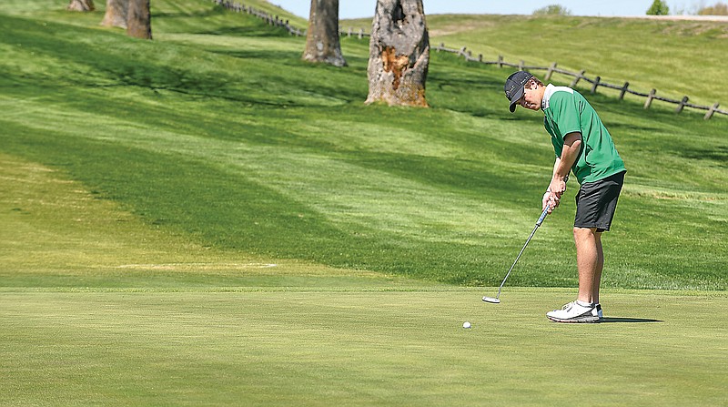 Jake Closser of Blair Oaks watches his putt during a tournament this season at Jefferson City Country Club. Closser and his Blair Oaks teammates will play in the Class 3 state tournament today and Tuesday in Farmington.