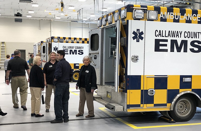 Callaway Chamber of Commerce Ambassadors tour the ambulance bay during Tuesday's ribbon cutting at the Callaway County Ambulance District's new facility. 