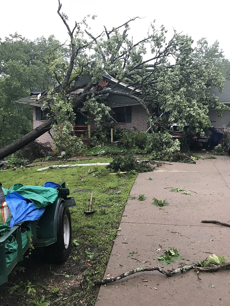 <p>Chris Leroux’s home on Holiday Drive just after the tornado. Two years later, there is no visible outside damage, but he is still working on repairs. Photo courtesy of Chris Leroux.</p>