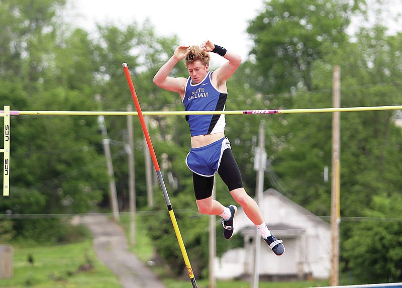<p>Greg Jackson/FULTON SUN</p><p>South Callaway’s Brendon Mealy watches the bar during a successful attempt in the boys pole vault Friday in the Class 2 state track and field champinships at Adkins Stadium in Jefferson City.</p>