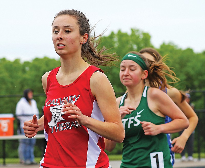 Calvary Lutheran's Maddie Homfeldt makes a turn toward the straightaway last Saturday in the 1,600-meter run at the Class 1 Sectional 1 meet in Mokane.