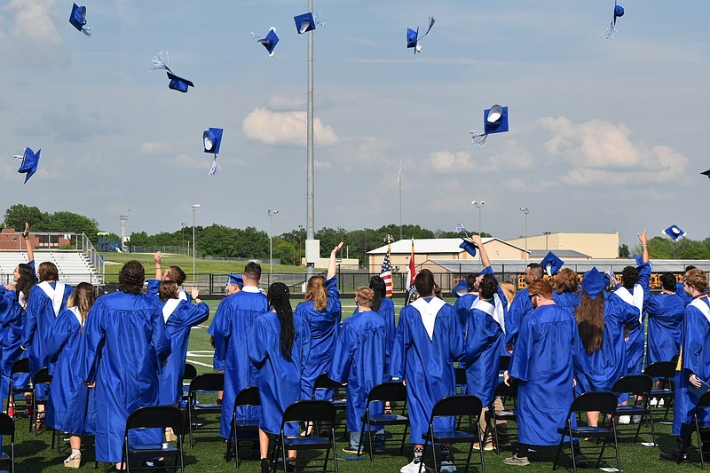 <p>Paula Tredway/FULTON SUN</p><p>South Callaway High School’s Class of 2021 graduated Sunday afternoon in Mokane, where they were recognized by family, friends, classmates and faculty members. With diplomas in hand, tassels switched over and hats off to 2021, the graduates are ready for their next chapter.</p>