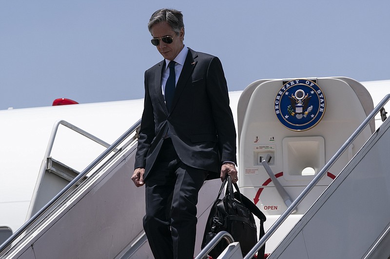 Secretary of State Antony Blinken steps off his plane upon arrival at Cairo International Airport, Wednesday, May 26, 2021, in Cairo, Egypt. (AP Photo/Alex Brandon, Pool)