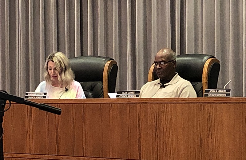 <p>Ryan Boland/FULTON SUN</p><p>Ward 4 councilwoman Lauren EH Nelson reads an ordinance while Ward 4 councilman Bob Washington listens during the Fulton City Council’s meeting Tuesday night at Fulton City Hall.</p>