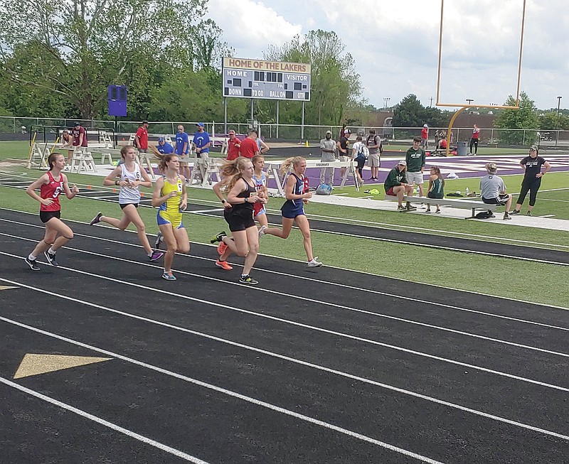 <p>Submitted</p><p>Fulton senior Kayanna Gaines (in black) competes in a race Saturday at the Class 4 sectional meet in Camdenton. Gaines will run the 1600- and 800-meter races today at the Class 4 state meet in Jefferson City.</p>