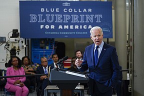 President Joe Biden delivers remarks on the economy at the Cuyahoga Community College Metropolitan Campus, Thursday, May 27, 2021, in Cleveland. (AP Photo/Evan Vucci)