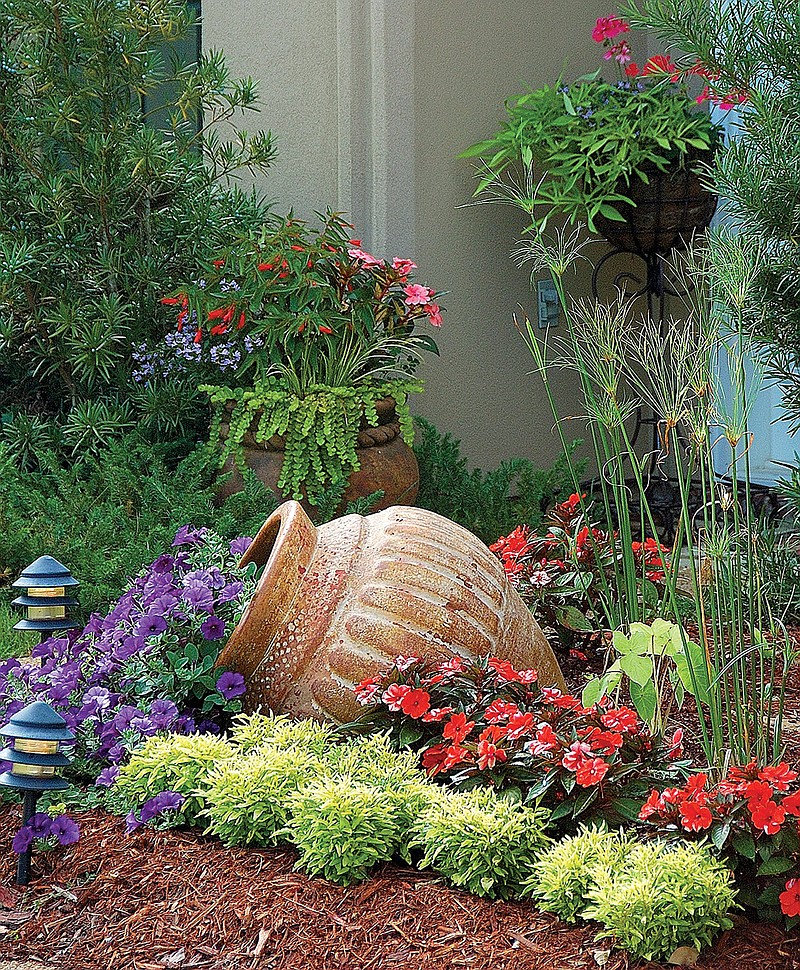 Flowers the key to curb appeal and it doesnt deplete the budget. Plant flowers in pockets of color close to your entrance. (Norman Winter/TNS)
