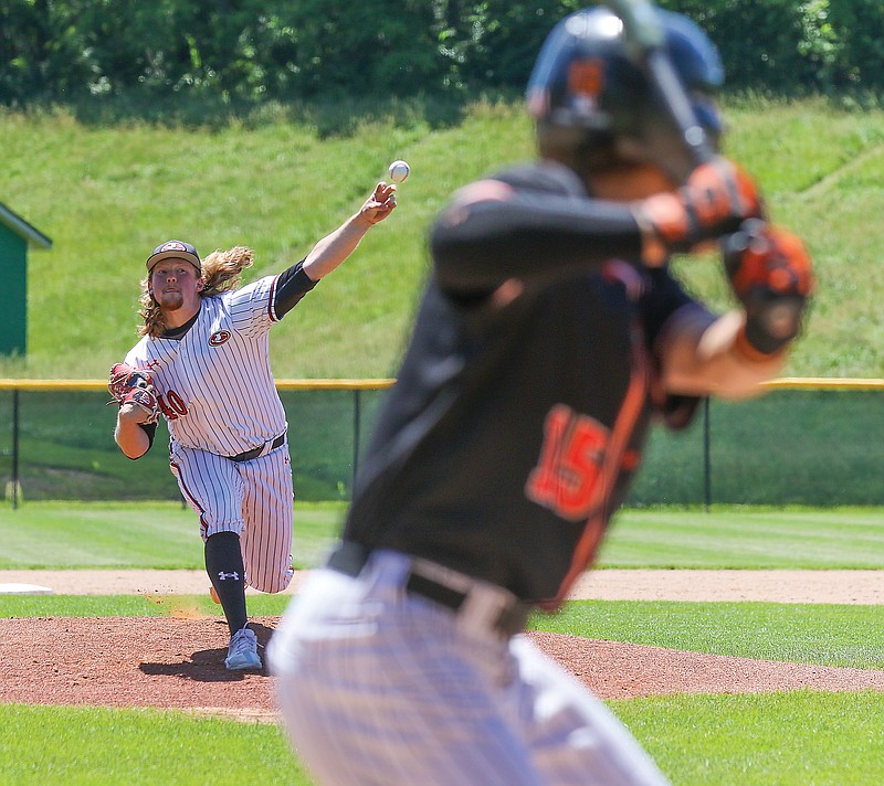 Jacob Roettgen of Jefferson City throws to the plate during Saturday afternoon's Class 6 quarterfinal game against Republic at Vivion Field.