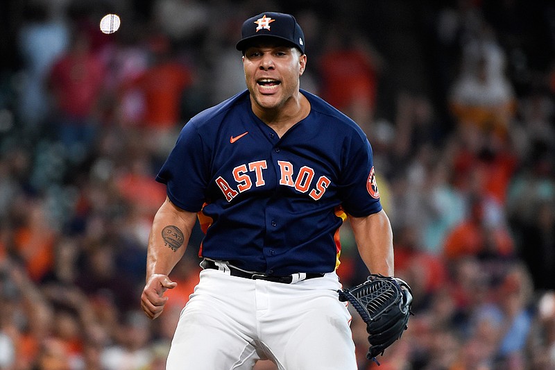 Houston Astros relief pitcher Andre Scrubb reacts after striking out San Diego Padres' Jorge Mateo to end the baseball game, Sunday, May 30, 2021, in Houston. (AP Photo/Eric Christian Smith)