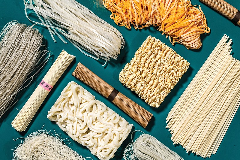 Left to right, top row: Banh pho rice noodles, egg wonton noodles. Middle row: Korean sweet potato starch glass noodles, somen noodles, udon noodles, soba noodles, instant ramen noodles, flat wheat noodles. Bottom: two types of rice vermicelli. MUST CREDIT: Photo by Laura Chase de Formigny for The Washington Post.