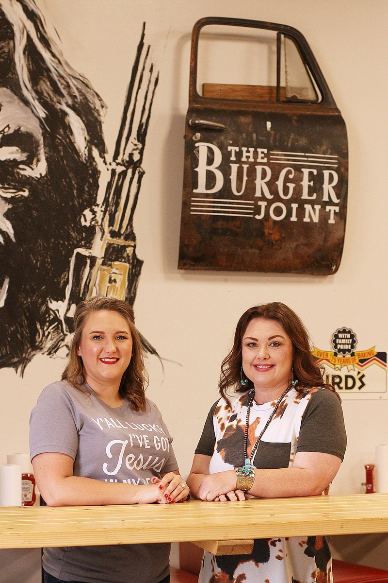 Lara Martin, left, and Jennifer Crawford pose for a photo at the Burger Joint. (Photo by Katie Stone)