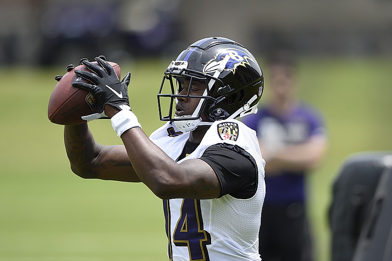 Ravens wide receiver Sammy Watkins catches a pass during organized team activities Wednesday in Owings Mills, Md.