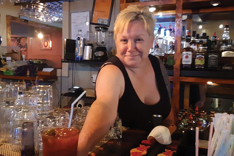 Jamie Reynolds serves up a spicy Bloody Mary at the Railyard Saloon.